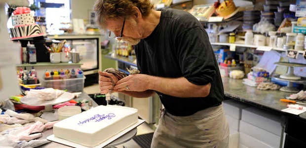 LAKEWOOD, CO - January 13: Jack Phillips, owner of Masterpiece Cake in Lakewood, decorates a birthday cake Thursday, January 3, 2012. (Photo by Lindsay Pierce, The Denver Post)