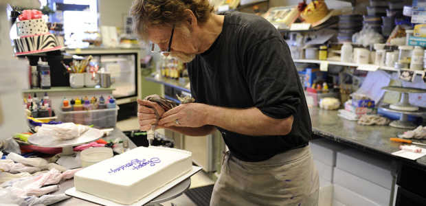 LAKEWOOD, CO - January 13: Jack Phillips, owner of Masterpiece Cake in Lakewood, decorates a birthday cake Thursday, January 3, 2012. (Photo by Lindsay Pierce, The Denver Post)