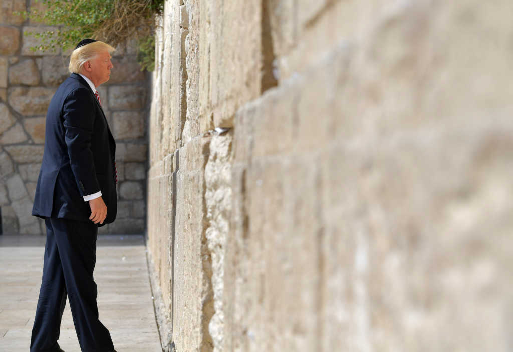 US President Donald Trump visits the Western Wall, the holiest site where Jews can pray, in Jerusalems Old City on May 22, 2017. / AFP PHOTO / MANDEL NGAN (Photo credit should read MANDEL NGAN/AFP/Getty Images)