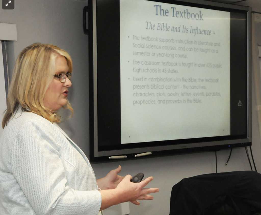 Amanda Aliff, the school system’s coordinator of pupil services, presented a high school Bible studies class plan to The Mercer County Board of Education on Tuesday night. Photo Credit: Bluefield Daily Telegraph/Amanda Aliff