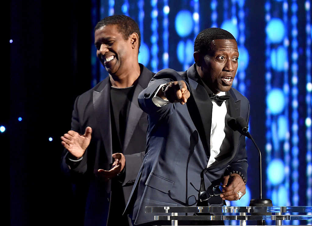 Actors Denzel Washington (L) and Wesley Snipes speak onstage during the Academy of Motion Picture Arts and Sciences' 7th annual Governors Awards at The Ray Dolby Ballroom at Hollywood & Highland Center on November 14, 2015 in Hollywood, California. (Photo by Kevin Winter/Getty Images)