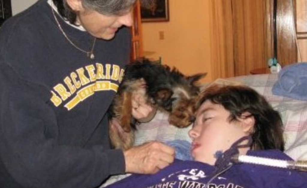 Robbie Kramer (left) with her son, Keith, and their family dog in 2010. (Photo credit: Robbie Kramer)