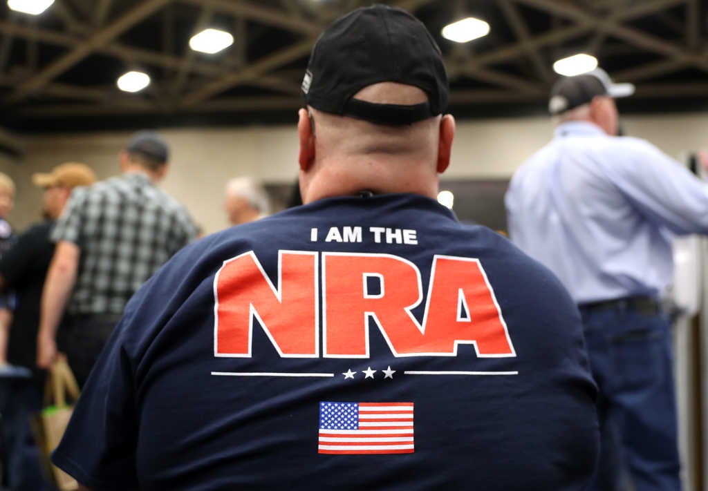 DALLAS, TX - MAY 05: An attendee wears an NRA shirt during the NRA Annual Meeting & Exhibits at the Kay Bailey Hutchison Convention Center on May 5, 2018 in Dallas, Texas. The National Rifle Association's annual meeting and exhibit runs through Sunday.