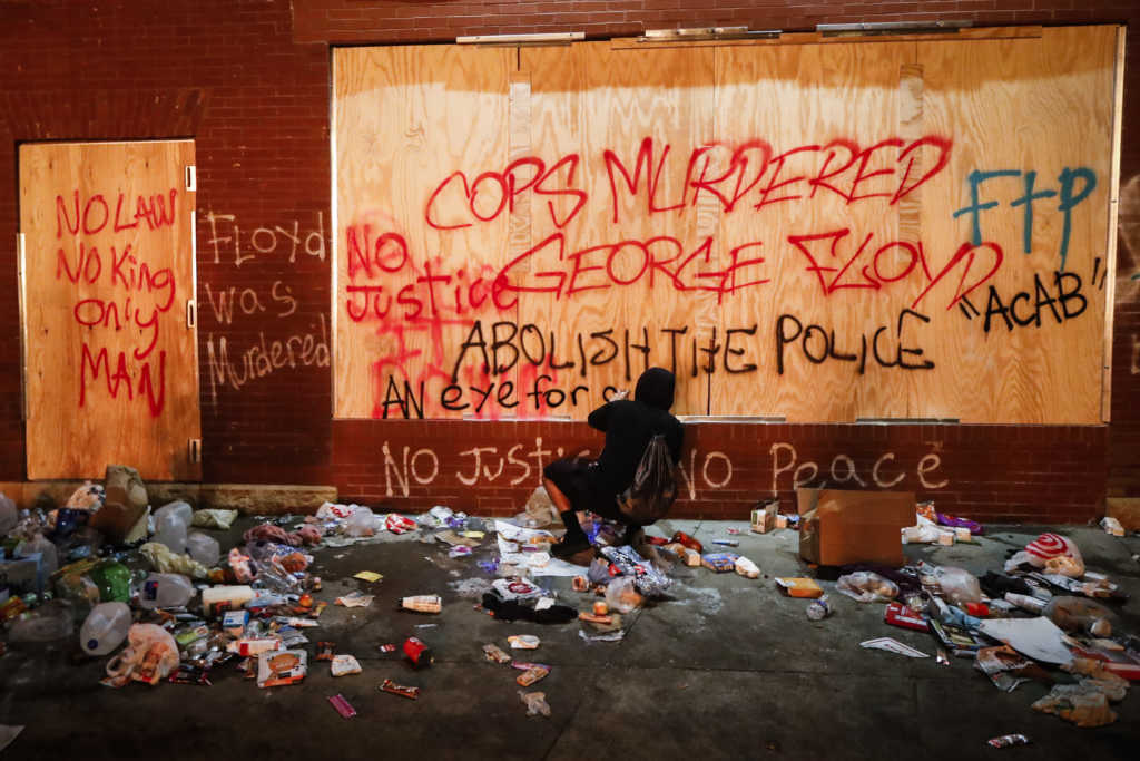 AP Photo/John Minchillo