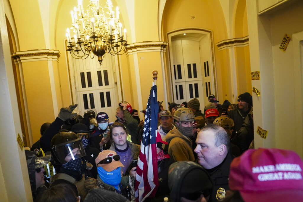 AP Photo/John Minchillo